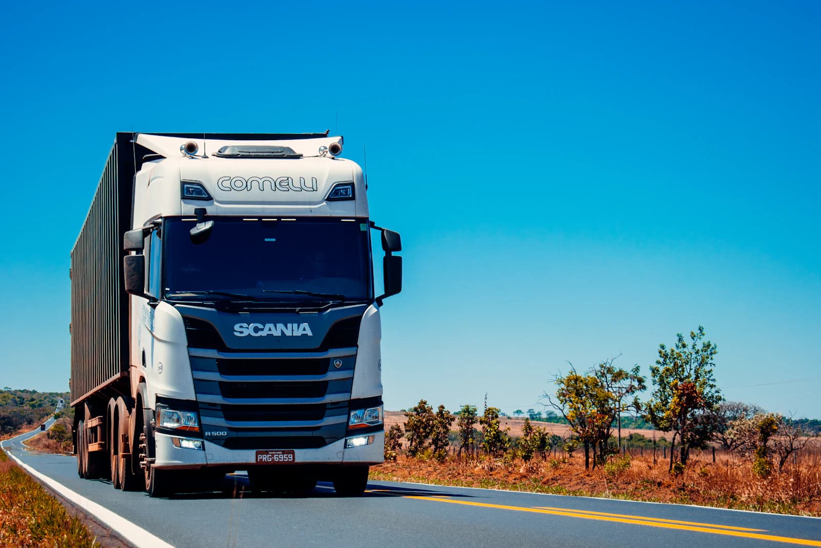 A delivery truck on an open highway